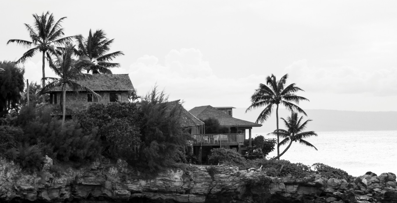 a group of houses by the water